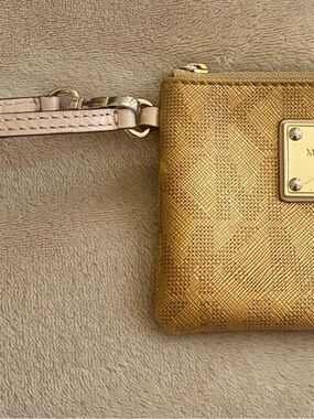 Michael Kors Gold Metallic Wristlet with Pale Pink Strap